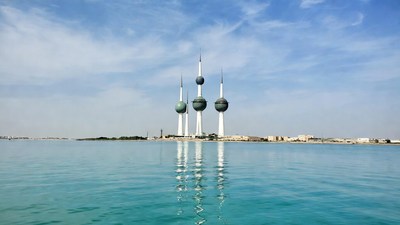 Kuwait Towers over turquoise water
