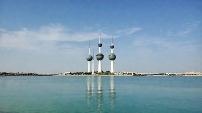 Kuwait Towers reflected in water