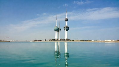 Kuwait Towers reflecting in water