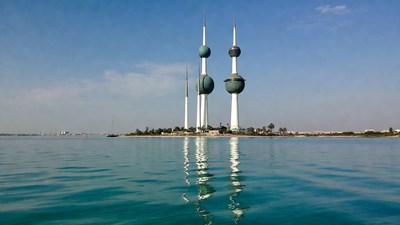 Kuwait Towers reflecting in water