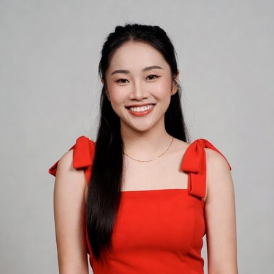 Asian woman in red bow strap top