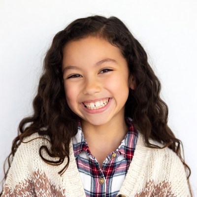 Smiling girl with curly hair