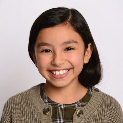 Asian girl smiling in sweater