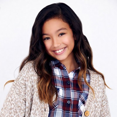 Smiling Asian girl in plaid shirt