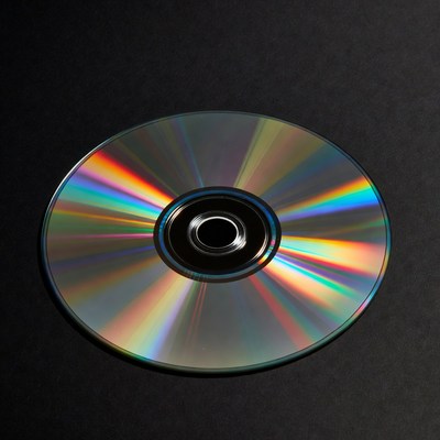 Shiny CD Disc on Black Background