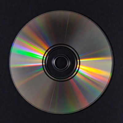 Shiny CD Disc on Black Background