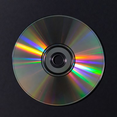 Shiny CD Disc on Black Background