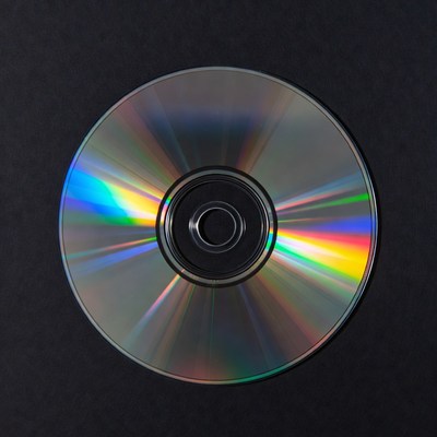 Shiny CD Disc on Black Background