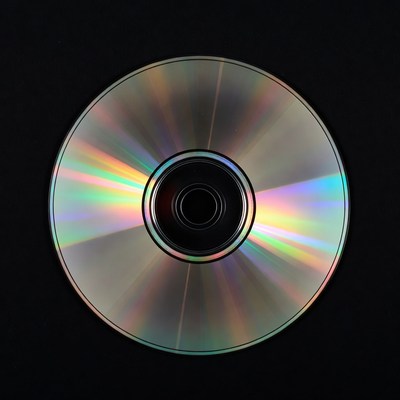 Shiny CD Disc on Black Background