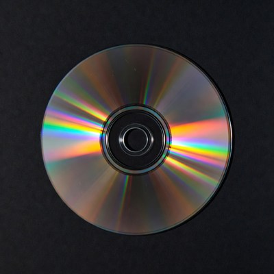 Shiny CD Disc on Black Background