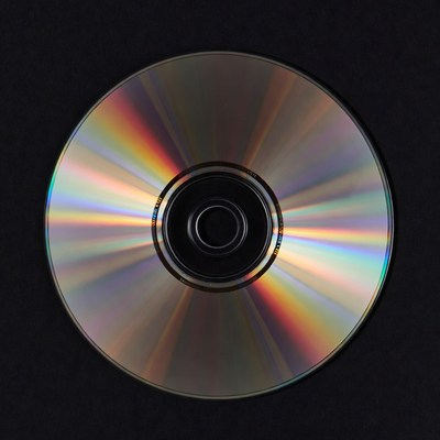 Shiny CD Disc on Black Background