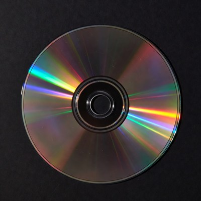 Shiny CD Disc on Black Background