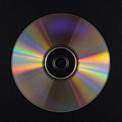 Shiny CD Disc on Black Background