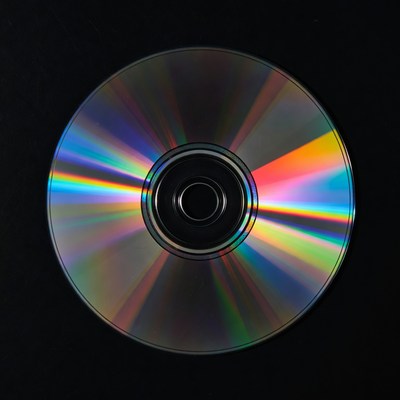 Shiny CD Disc on Black Background