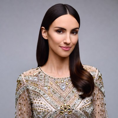 Woman in sparkling beaded gown