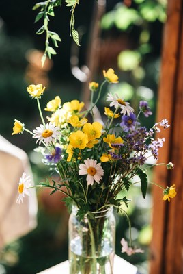 Colorful wildflowers in glass jar