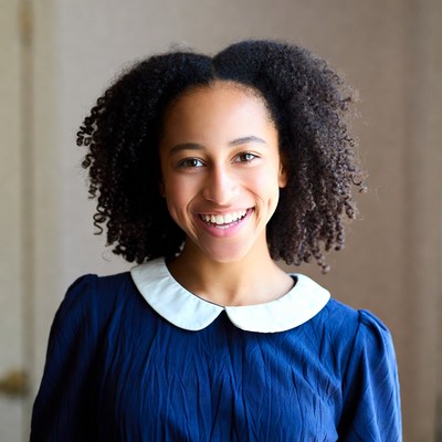 Smiling African-American girl in blue dress