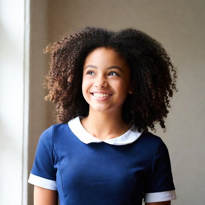 Smiling African-American girl with curly hair
