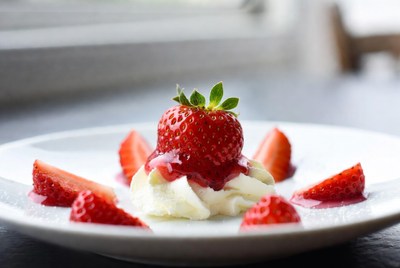 Strawberries with Cream on Plate