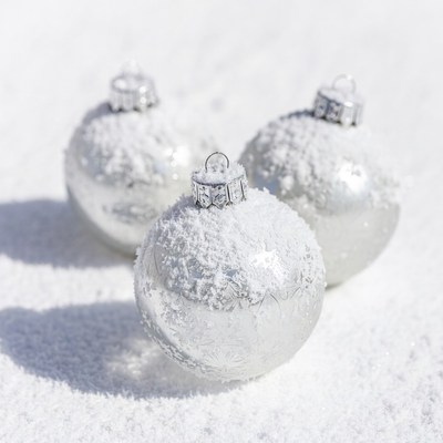 Snowy Silver Christmas Ornaments on Snow