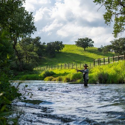 Man fly fishing in river