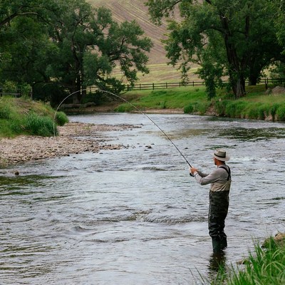 Man fly fishing in river