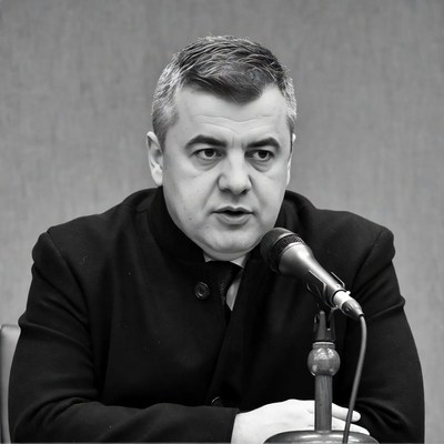 Man speaking into microphone