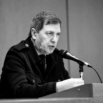 Man speaking at podium