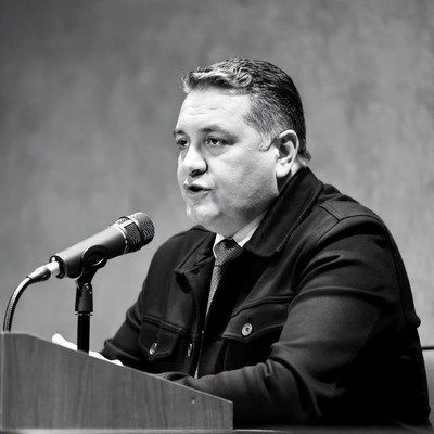 Man speaking at podium