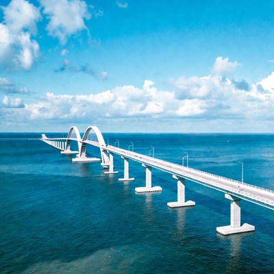 Arch Bridge Over Blue Ocean