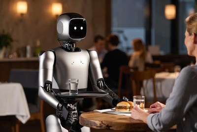 Robot serving burger to woman