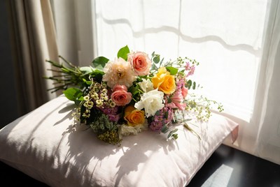 Colorful Flower Bouquet on Pink Pillow