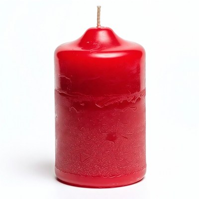 Red pillar candle on white background