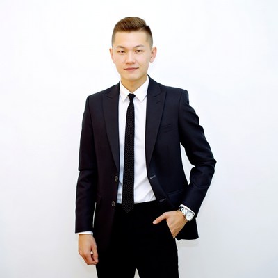 Asian man in black suit