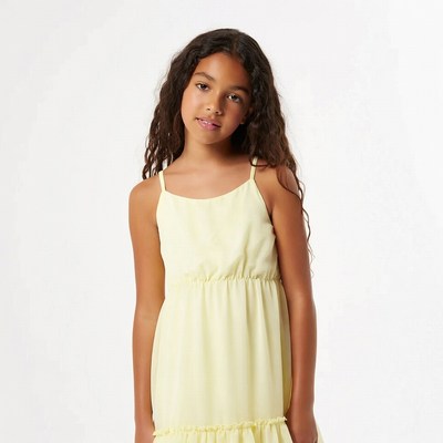 Young Black girl in yellow sundress