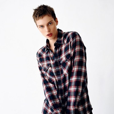 Woman in plaid shirt portrait