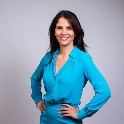 Smiling Latina woman in blue blouse