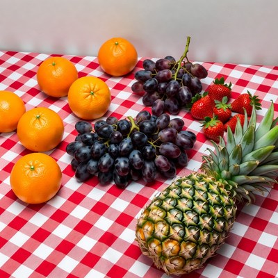 Fresh Oranges Grapes Strawberries Pineapple