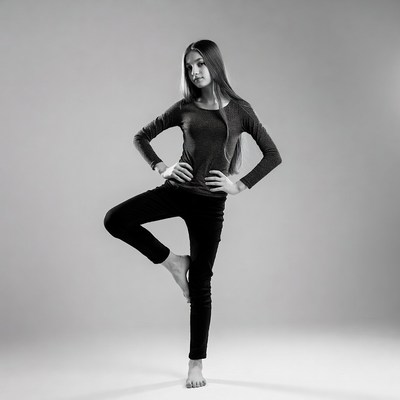 Girl doing tree pose yoga