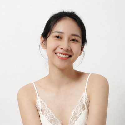 Asian woman smiling in lace top