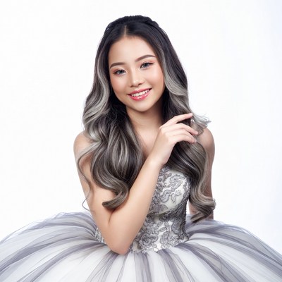 Asian woman in silver gown