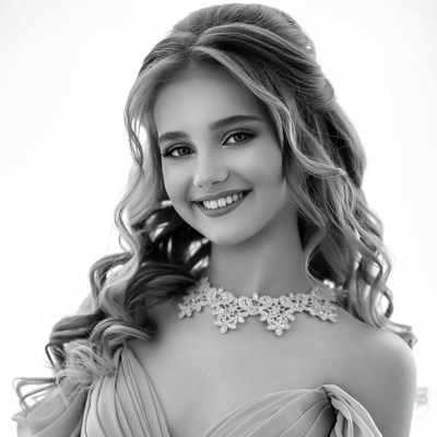 Smiling woman with lace necklace