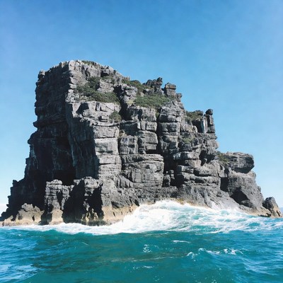 Rocky Island in Turquoise Ocean