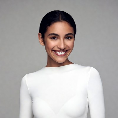 Smiling woman in white dress