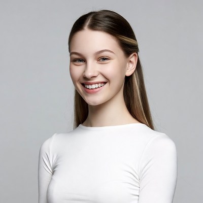 Smiling young woman in white top