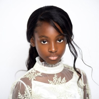 African-American girl in lace dress