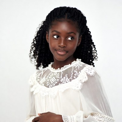 African-American girl in lace blouse