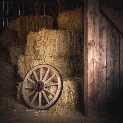 Wooden Wagon Wheel and Hay Bales