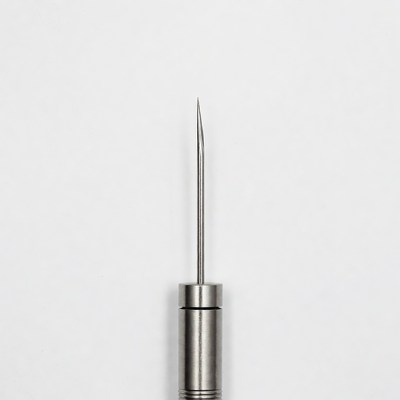 Metal Needle on White Background
