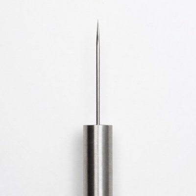 Silver sewing needle isolated